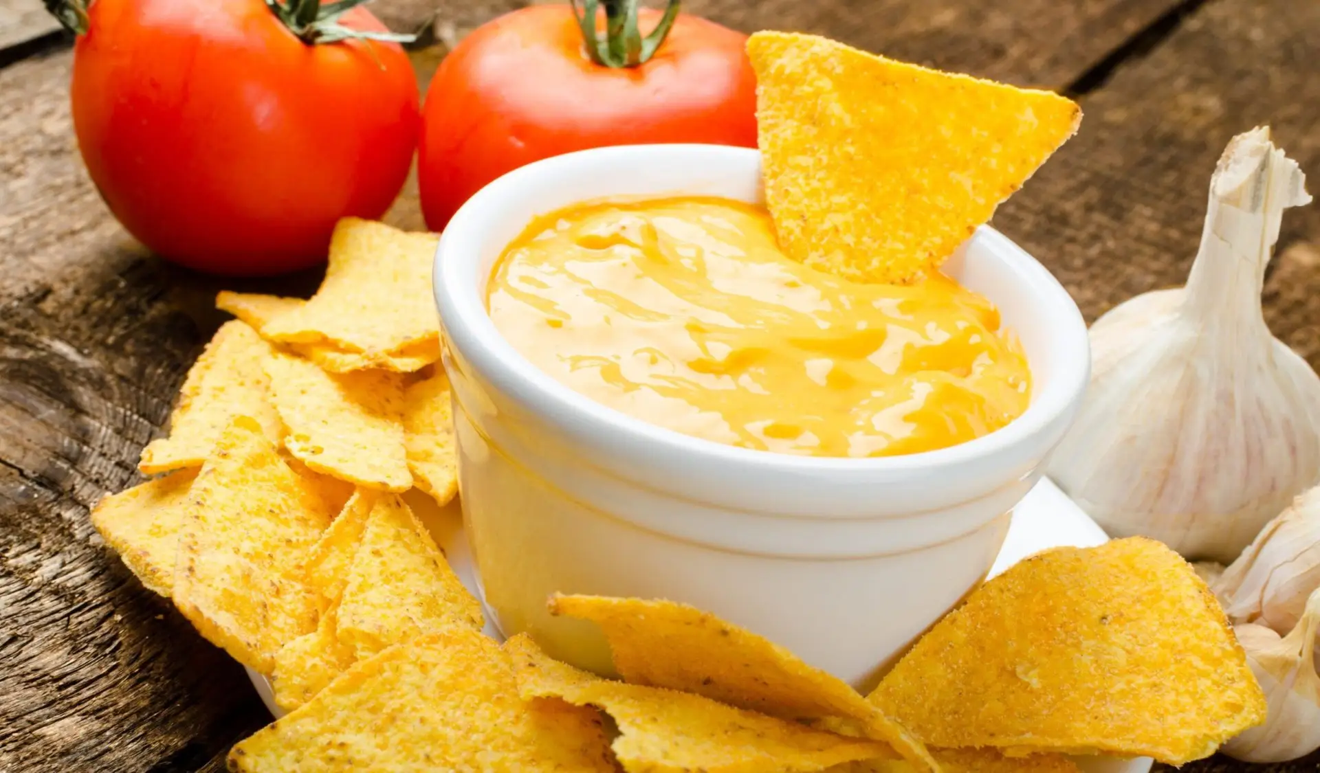 Heerlijke kaassaus kopen voor nacho's en gegrilde groenten met frisse cheddar smaak